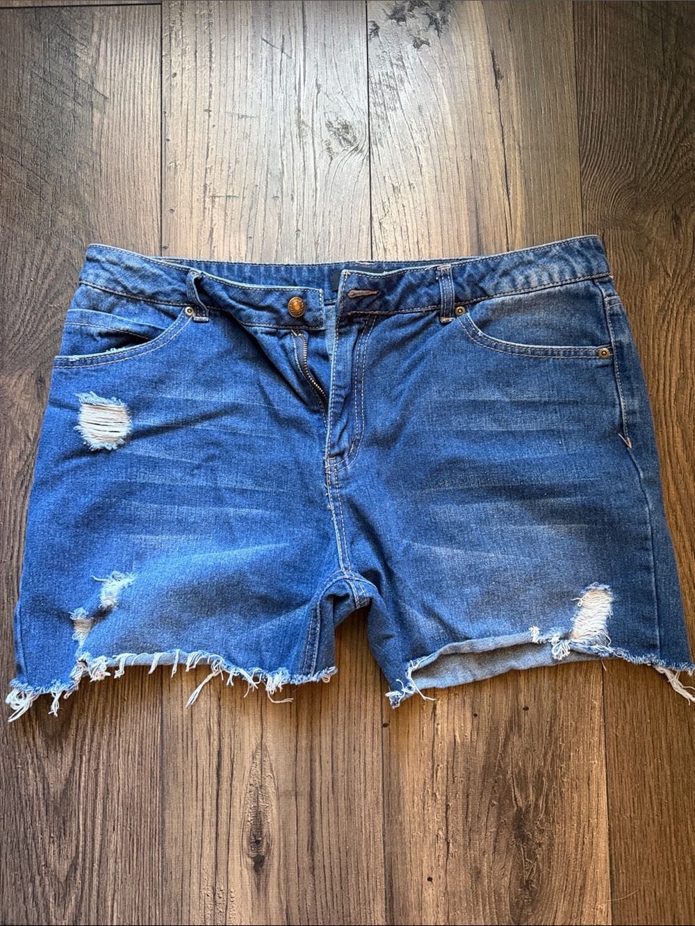 Women’s Distressed Blue Denim Jean Shorts with Frayed Hem